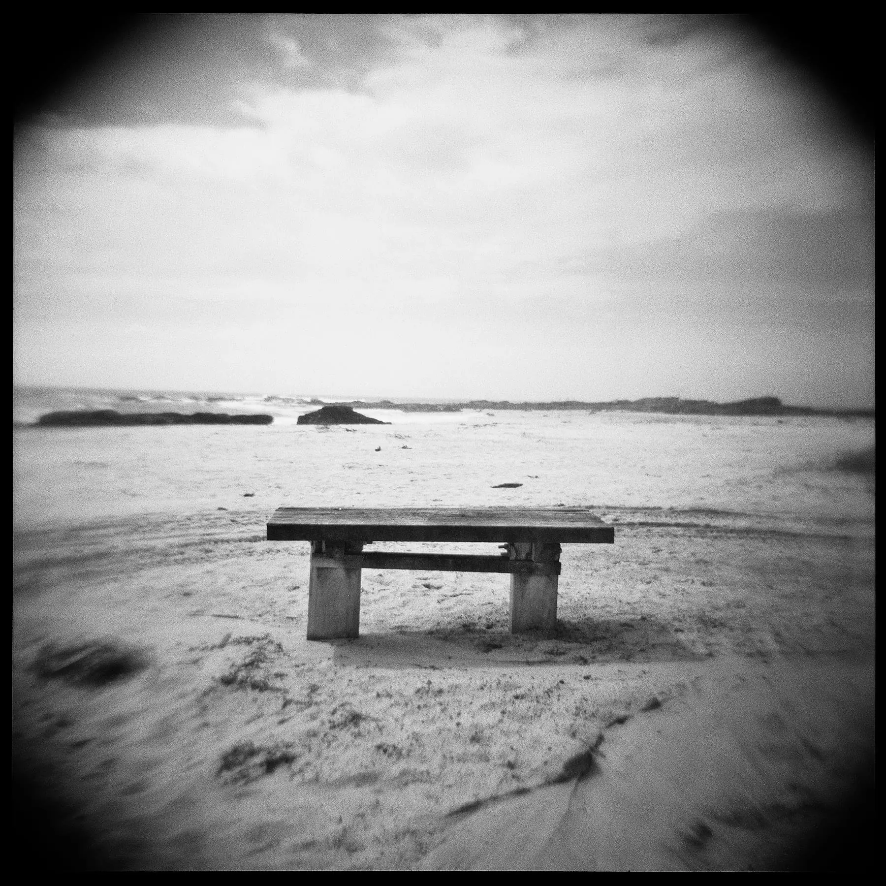 actephilia1 A weathered old bench sits alone on a desolate, sandy beach on Australia's east coast.